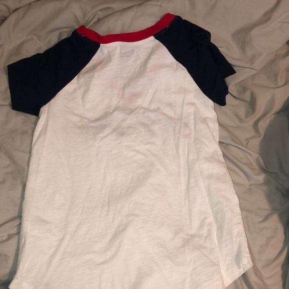 A Tommy Hillfiger v-neck t-shirt. - Picture 2 of 3